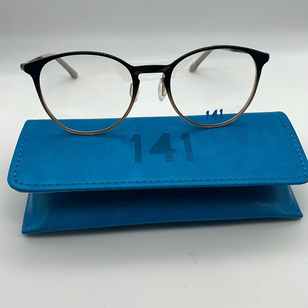 New 141 eyeglasses with case